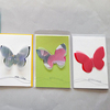 Bild: 3 verschiedene Karten mit Schmetterlings-Motiv. 